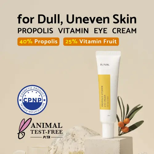 White tube of iunik propolis vitamin eye cream with yellow label 30ml for acne-prone skin types with vitamin fruit extract