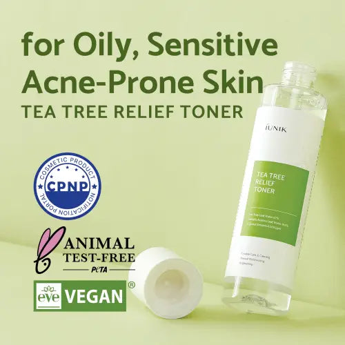 Clear glass bottle of iunik tea tree relief toner 200ml with white label green accent minimalist design