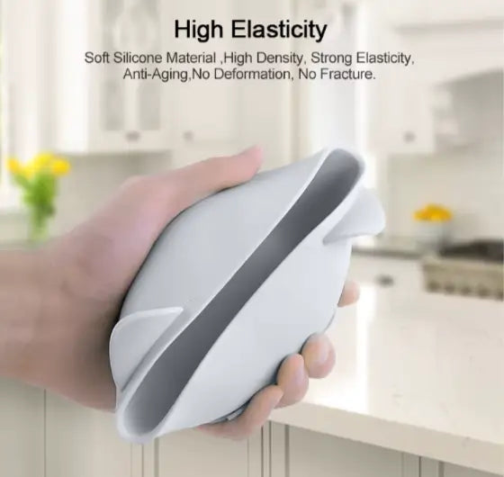 Hand holding a silicone kitchen tool with text highlighting its properties in a kitchen setting.