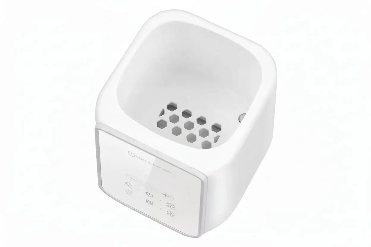 White electronic device with control panel on a white background