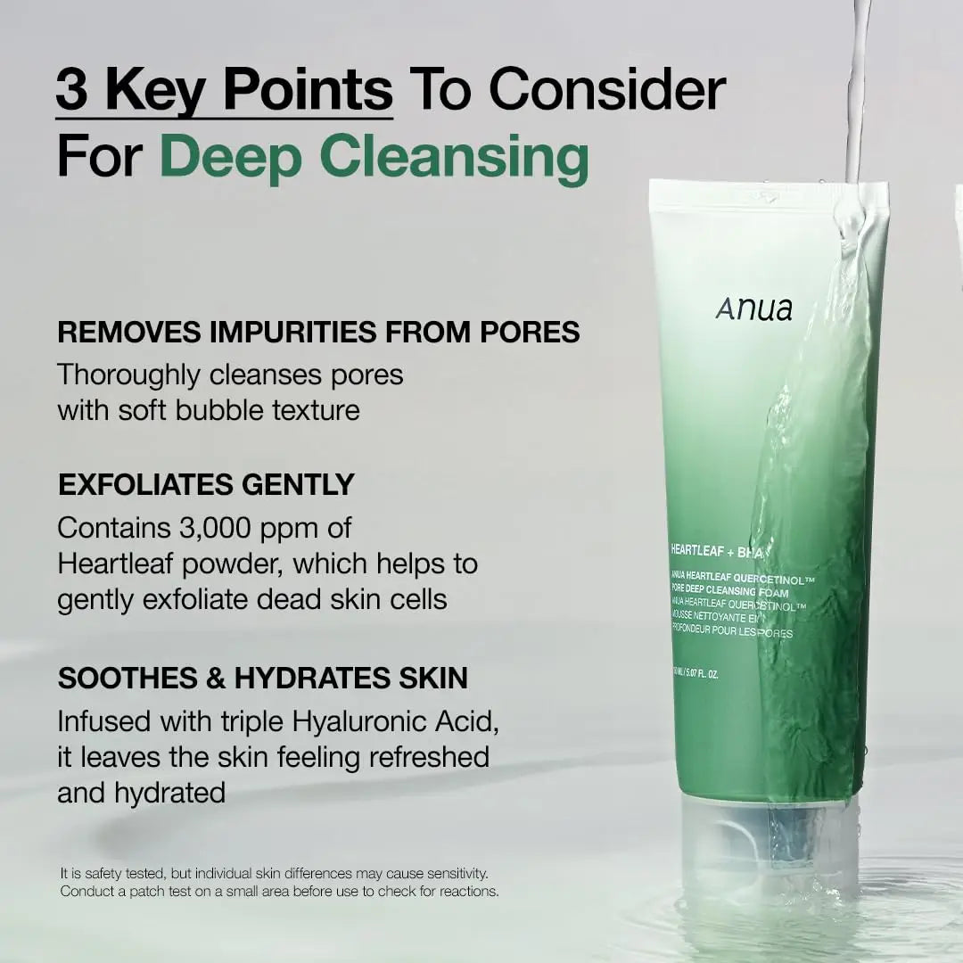 ANUA Heartleaf Quercetinol Pore Deep Cleansing Foam 150ml tube shown with water pouring over it, highlighting features like pore cleansing, gentle exfoliation with heartleaf powder, and hydration with hyaluronic acid.