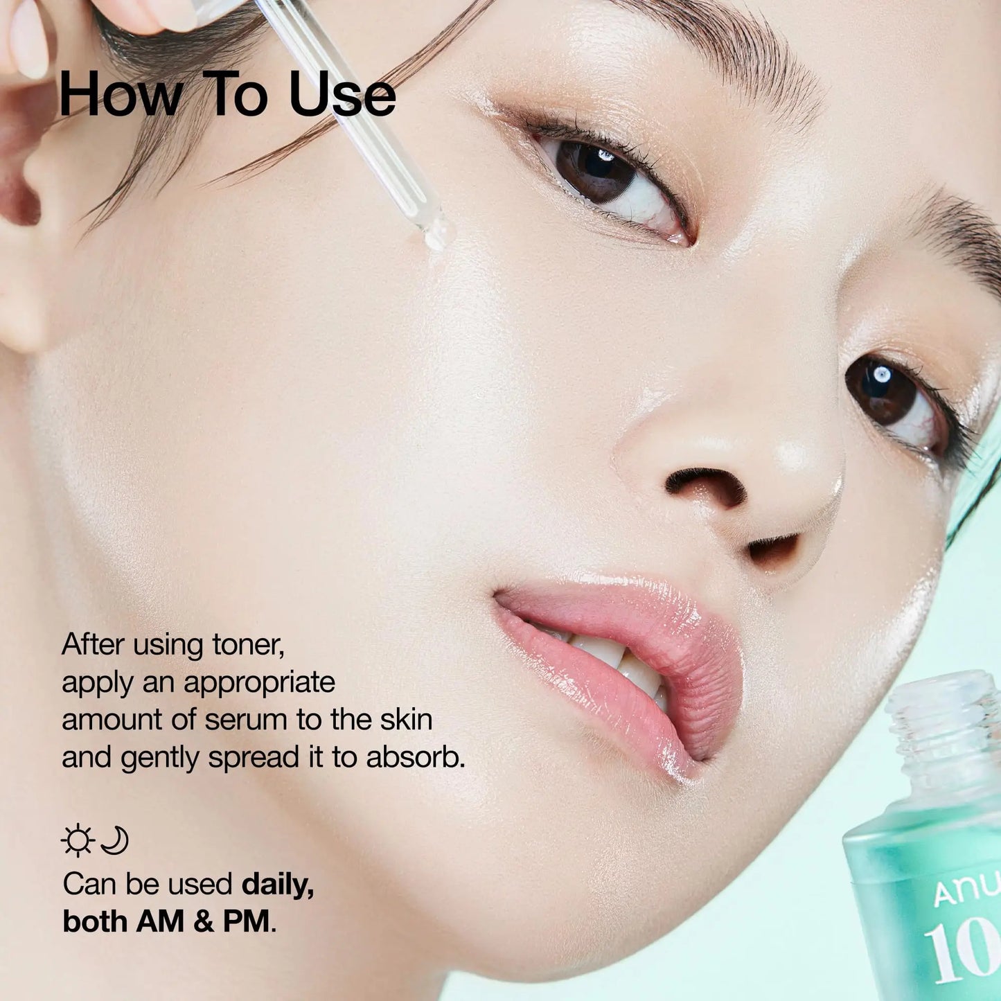 Close-up of a woman applying Anua PDRN Hyaluronic Acid Capsule 100 Serum 30ml with a dropper to her cheek, demonstrating gentle application for daily use in morning and evening skincare routines.