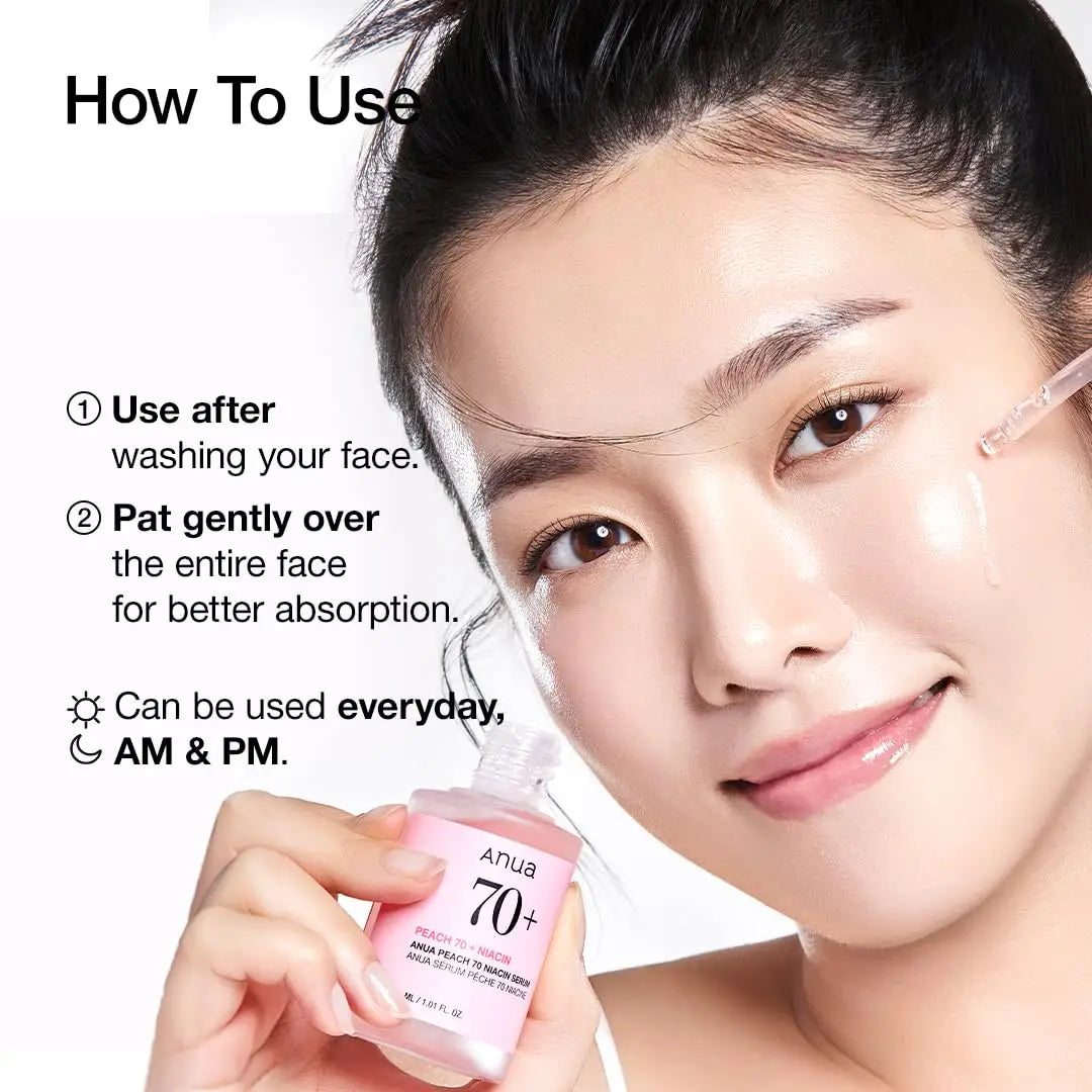 Woman with clear skin applying Anua Peach 70 Niacinamide Serum 30ml using a dropper on her face, demonstrating skincare routine instructions for daily use.