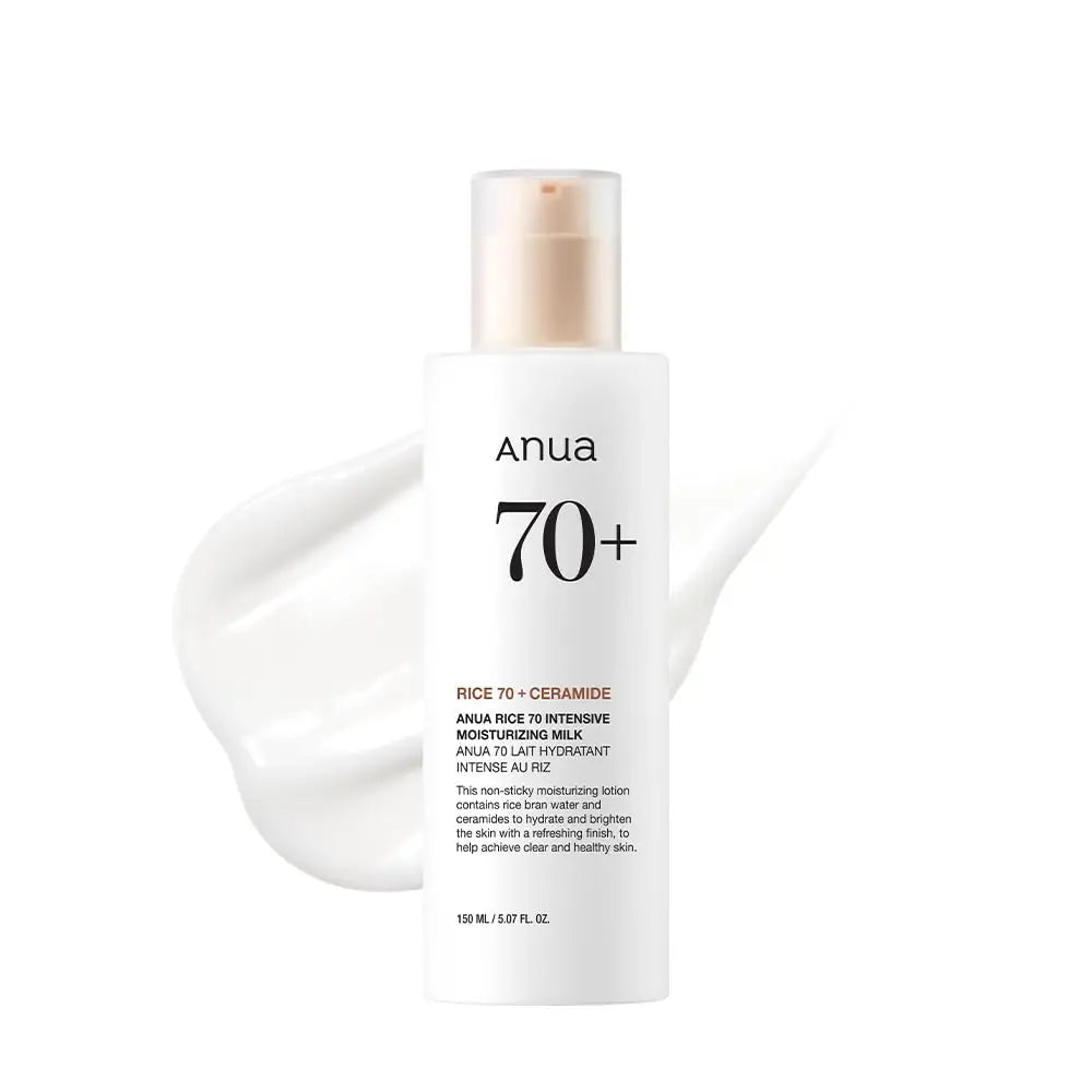 Anua Rice 70 Intensive Moisturizing Milk 50ml bottle with creamy white lotion spread behind, highlighting its hydrating and brightening formula for healthy skin.
