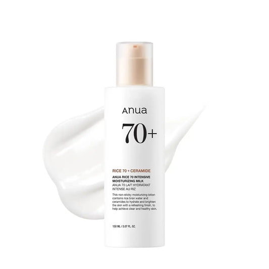 Anua Rice 70 Intensive Moisturizing Milk 50ml bottle with creamy white lotion spread behind, highlighting its hydrating and brightening formula for healthy skin.