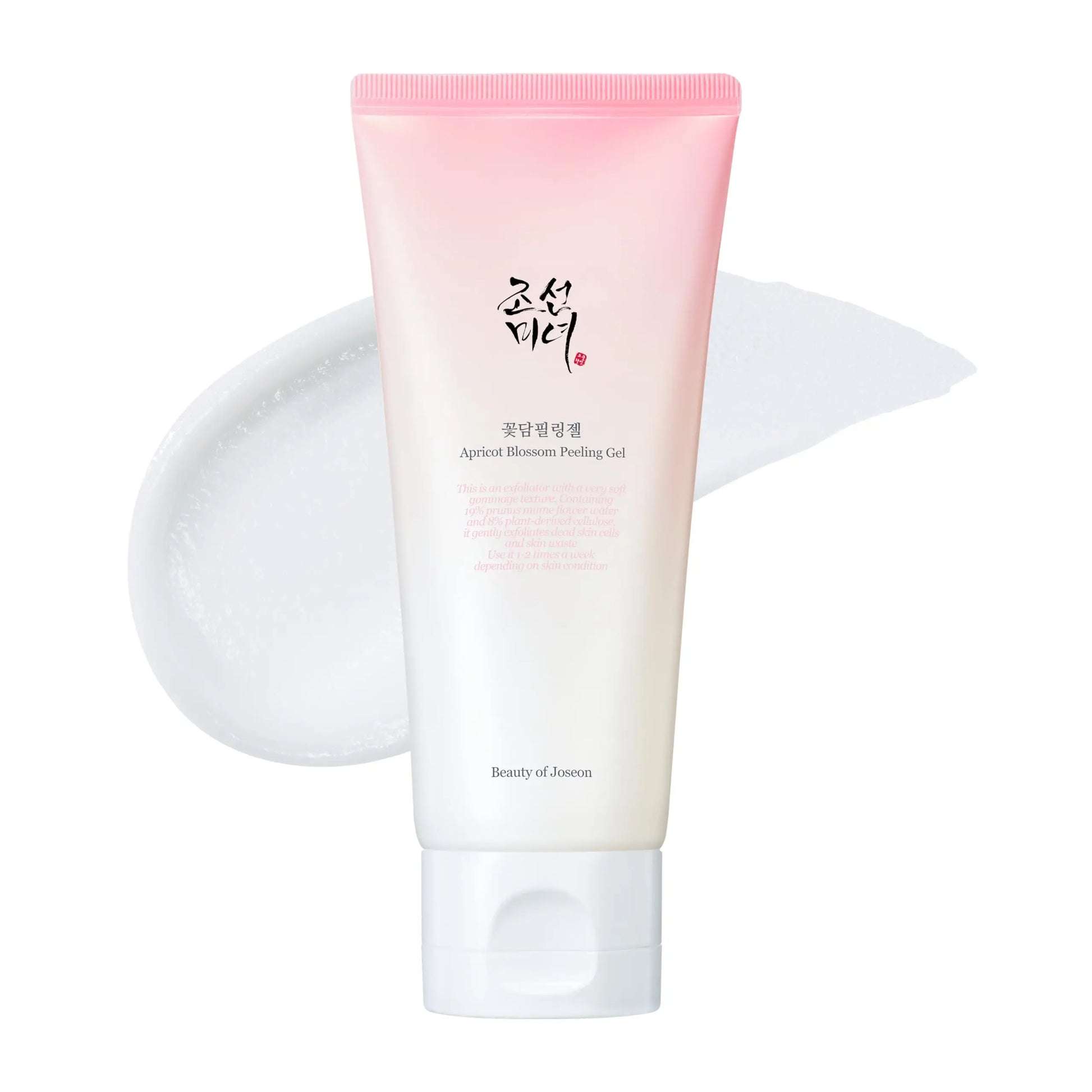 Beauty of Joseon Apricot Blossom Peeling Gel 100ml in a white and pink gradient tube next to a dollop of clear gel with exfoliating texture against a white background.