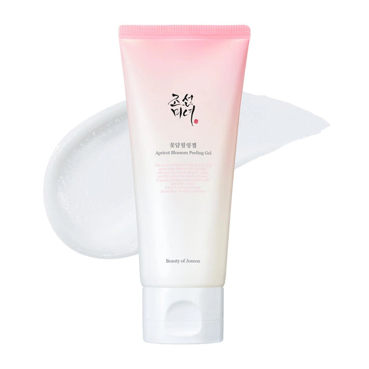 Beauty of Joseon Apricot Blossom Peeling Gel 100ml in a white and pink gradient tube next to a dollop of clear gel with exfoliating texture against a white background.