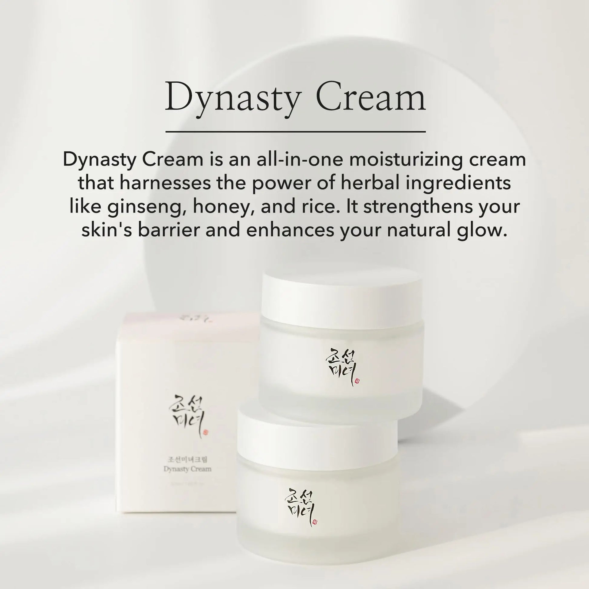 Two frosted glass jars and a white box of Beauty of Joseon Dynasty Cream 100ml displayed against a soft, neutral background with descriptive text about the moisturizing cream's herbal ingredients and benefits.
