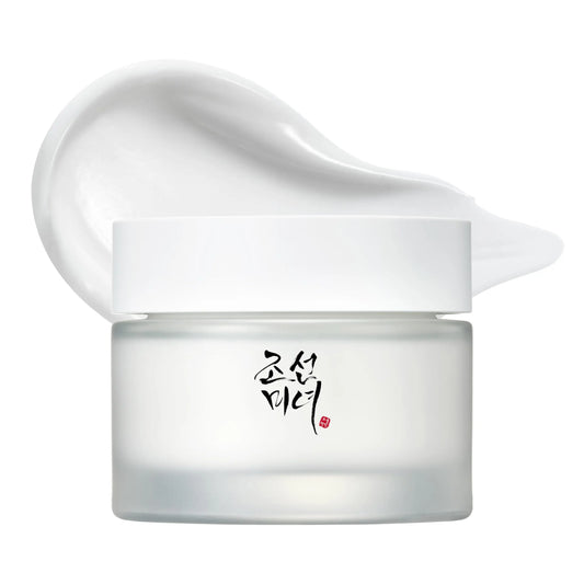 Beauty of Joseon Dynasty Cream 50ml in a frosted jar with white lid, shown with a smooth cream texture in the background, promoting hydration and skin nourishment.