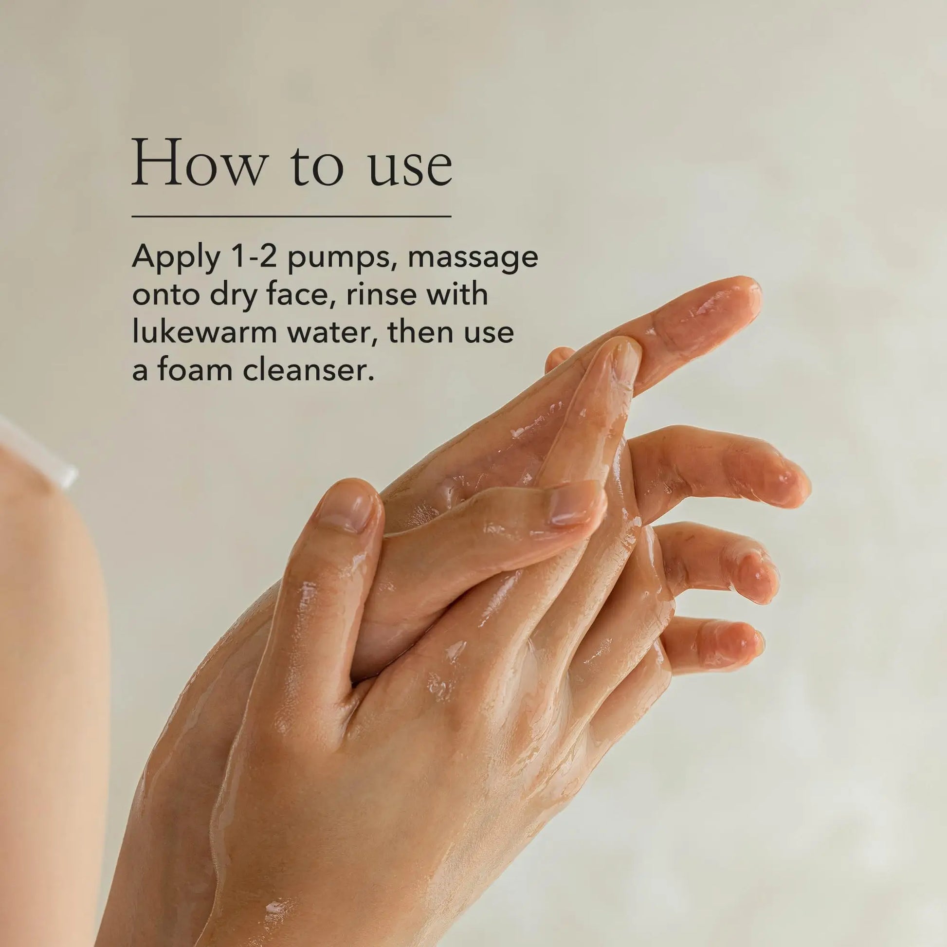 Close-up of hands applying Beauty of Joseon Ginseng Cleansing Oil 210ml with instructions for use, demonstrating gentle massage on dry skin before rinsing.