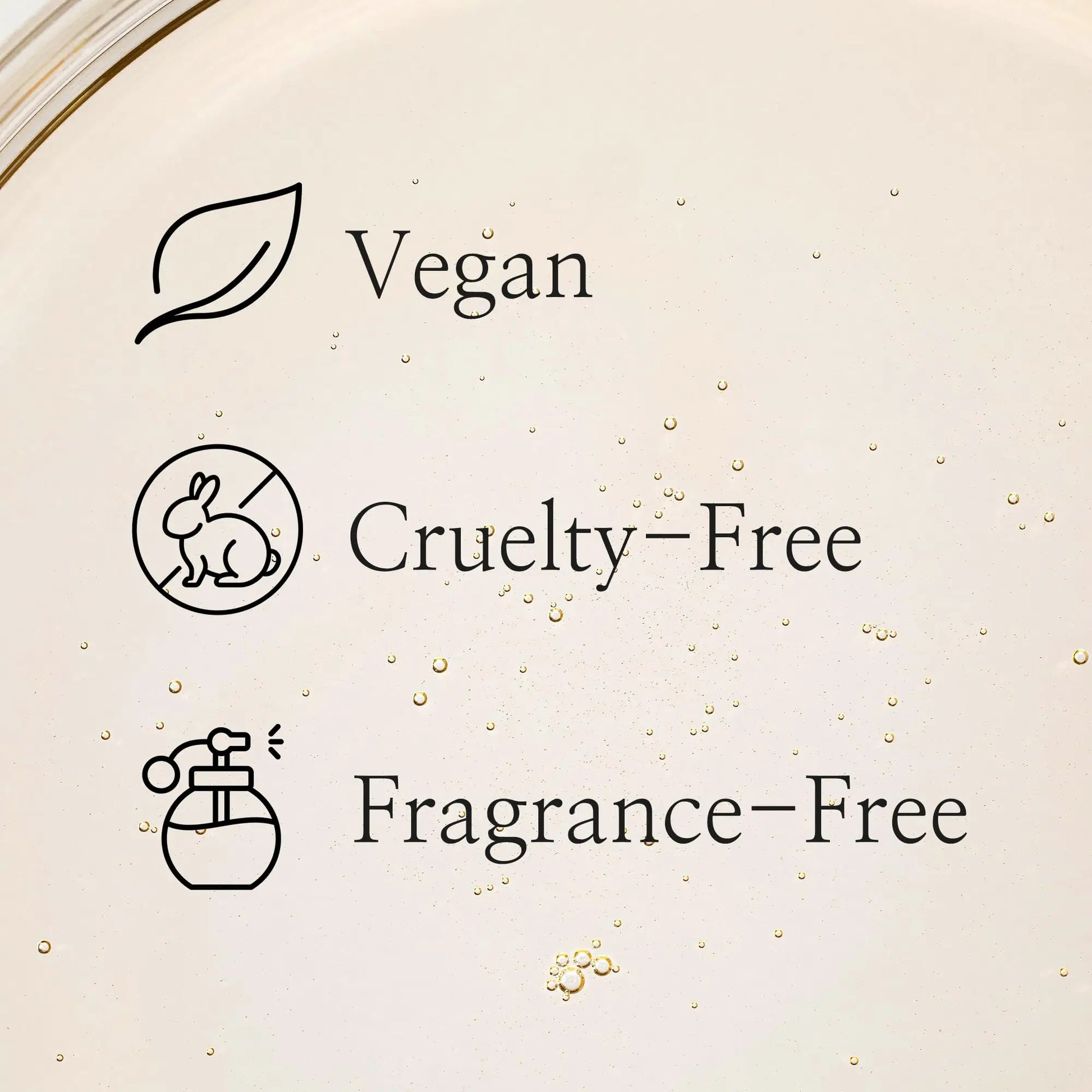 Close-up of liquid droplets with icons and text indicating Beauty of Joseon Ginseng Cleansing Oil 210ml is vegan, cruelty-free, and fragrance-free.