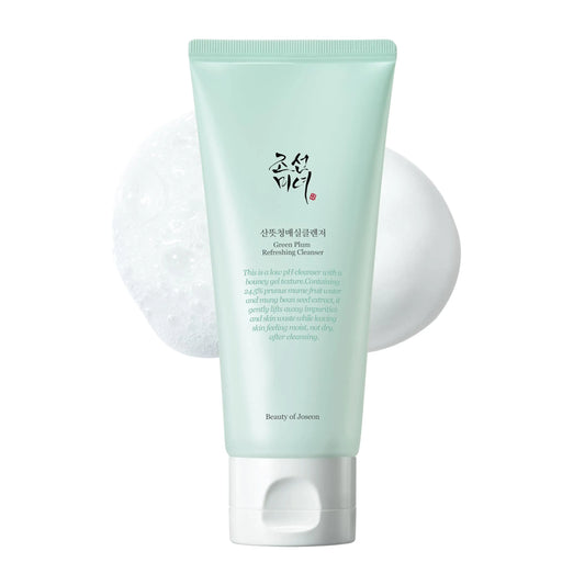 Beauty of Joseon Green Plum Refreshing Cleanser 100ml in a pastel green tube with white cap, shown with foamy cleanser texture and smooth cream on a white background