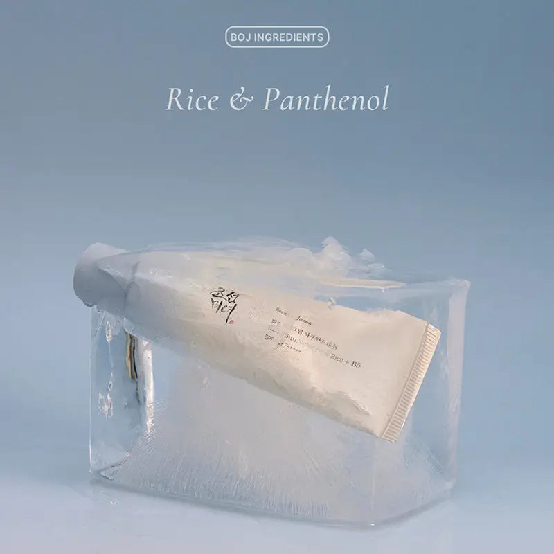 Beauty of Joseon Relief Sun Aqua-Fresh : Rice + B5 sunscreen tube encased in a block of ice with text highlighting rice and panthenol ingredients against a pale blue background