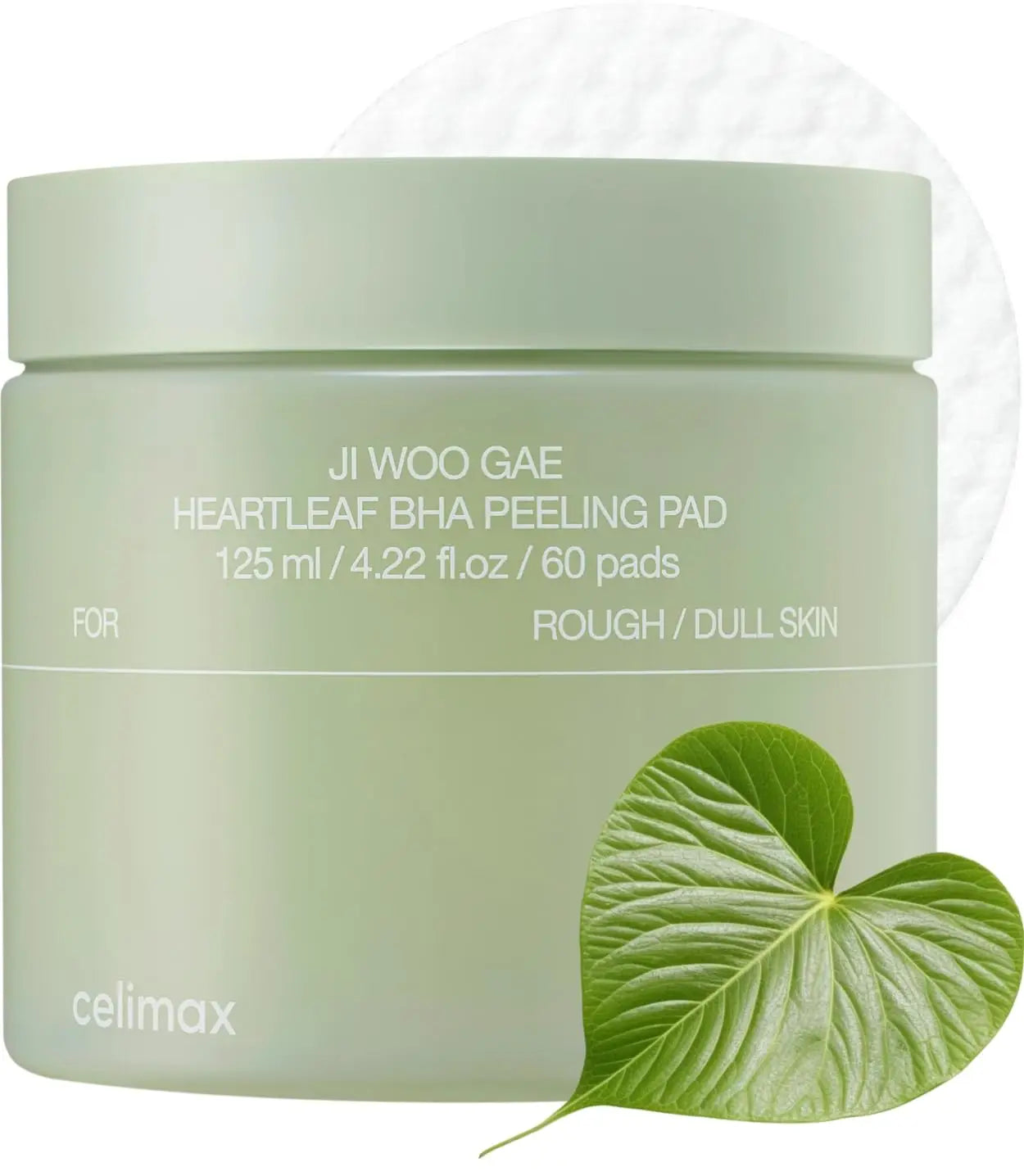 celimax Ji.Woo.Gae Heartleaf BHA Peeling Pad (60 Pads) in a light green container with a heartleaf plant beside it and a peeling pad in the background for rough and dull skin care.