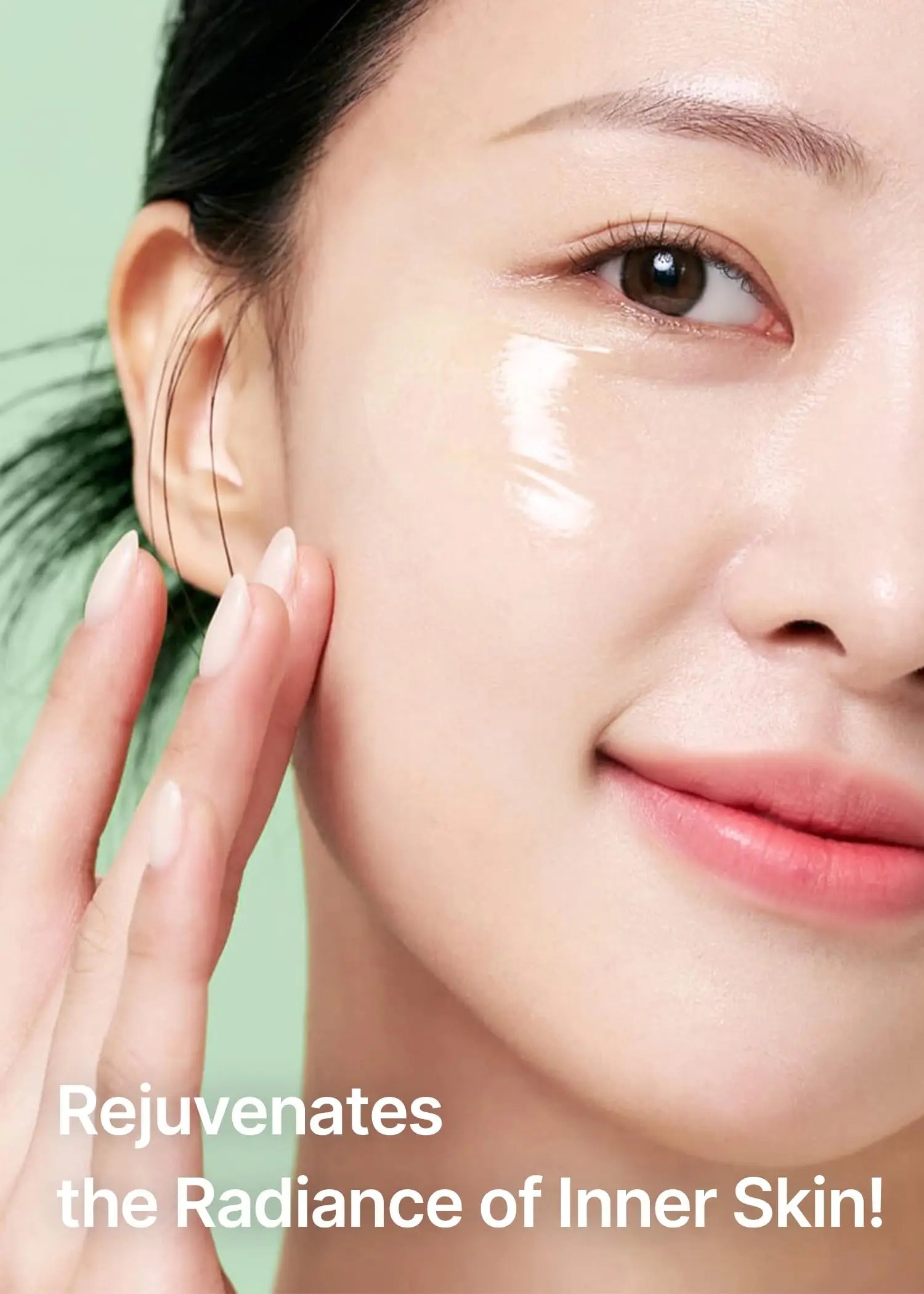 Close-up of a woman gently applying celimax Noni Energy Ampoule 30ml on her cheek, showcasing smooth, radiant skin with natural glow and hydration.