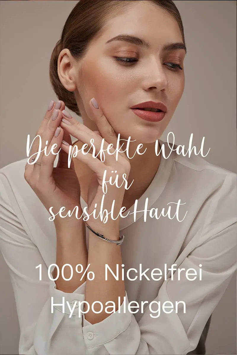 Woman softly touching her face and wrist wearing Einzelstück - 14K Gold Plated Emerald Drop Necklace - Emerald water drop Necklace - Gold Necklaces Gift for Women, showcasing elegant gold jewelry for sensitive skin.