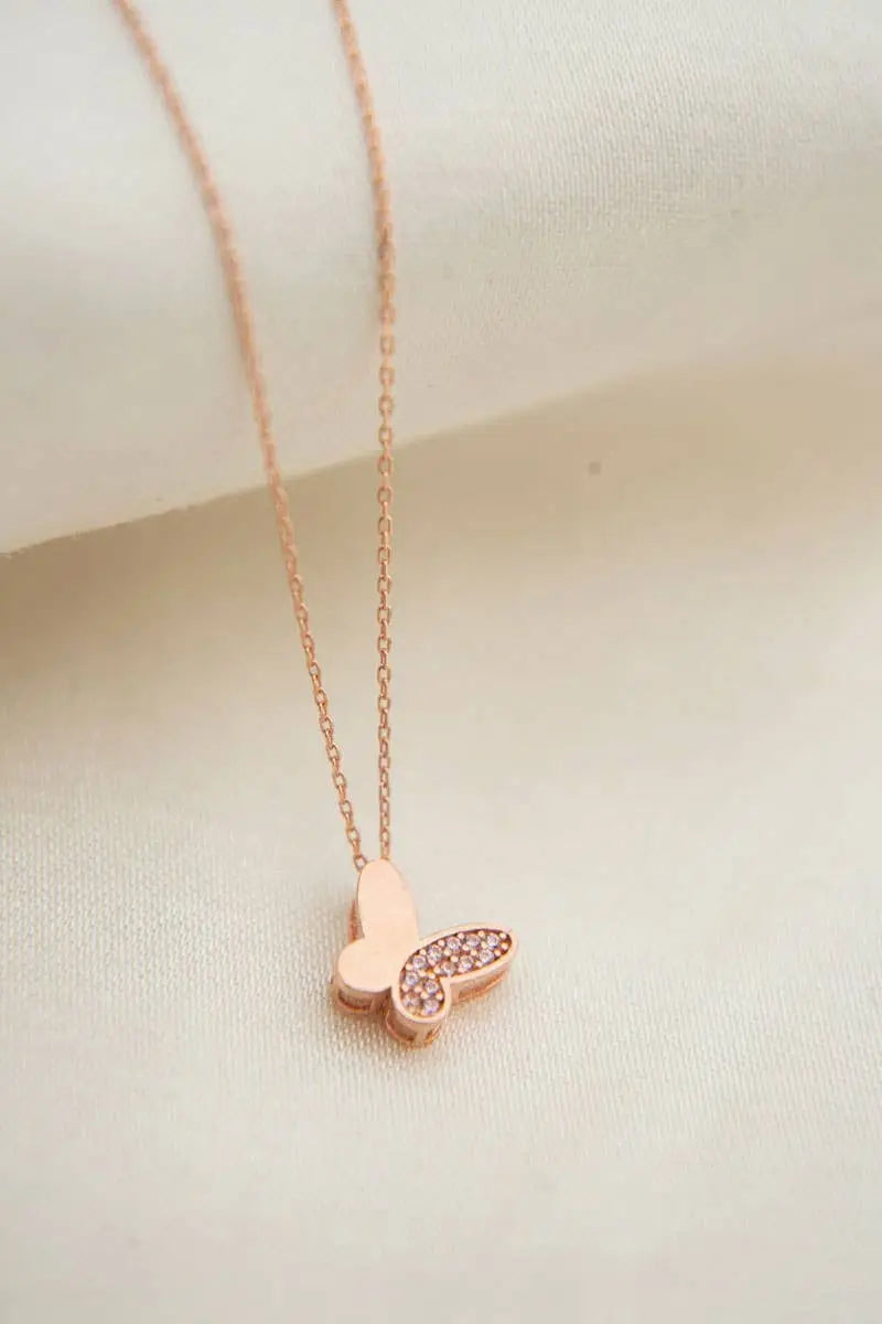 Elegant Einzelstück - 14K Gold Plated Farfalle Necklace featuring a delicate butterfly pendant adorned with small sparkling stones, perfect Gold Necklaces Gift for Women.