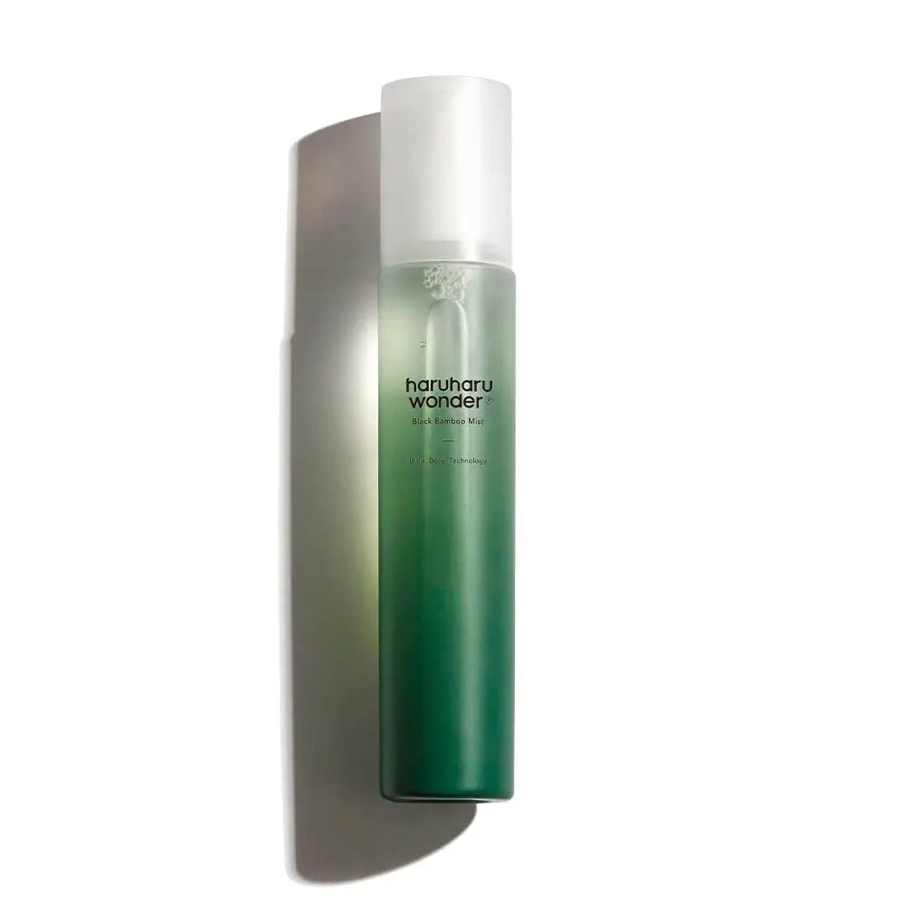 haruharu wonder Black Bamboo Mist 150ml in a sleek green gradient bottle with a frosted white cap casting a shadow on a white background