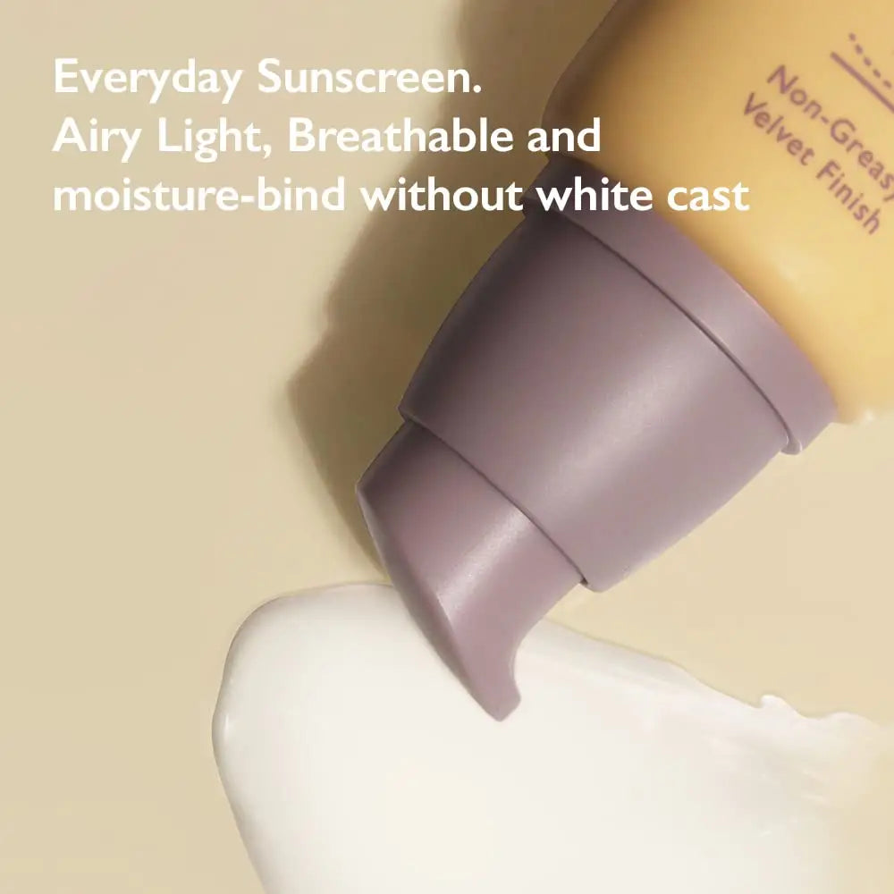Tube of haruharu wonder Black Rice Moisture Airyfit Sunscreen 50ml dispensing smooth white sunscreen cream on beige surface with text highlighting airy light, breathable, and moisture-bind formula without white cast.