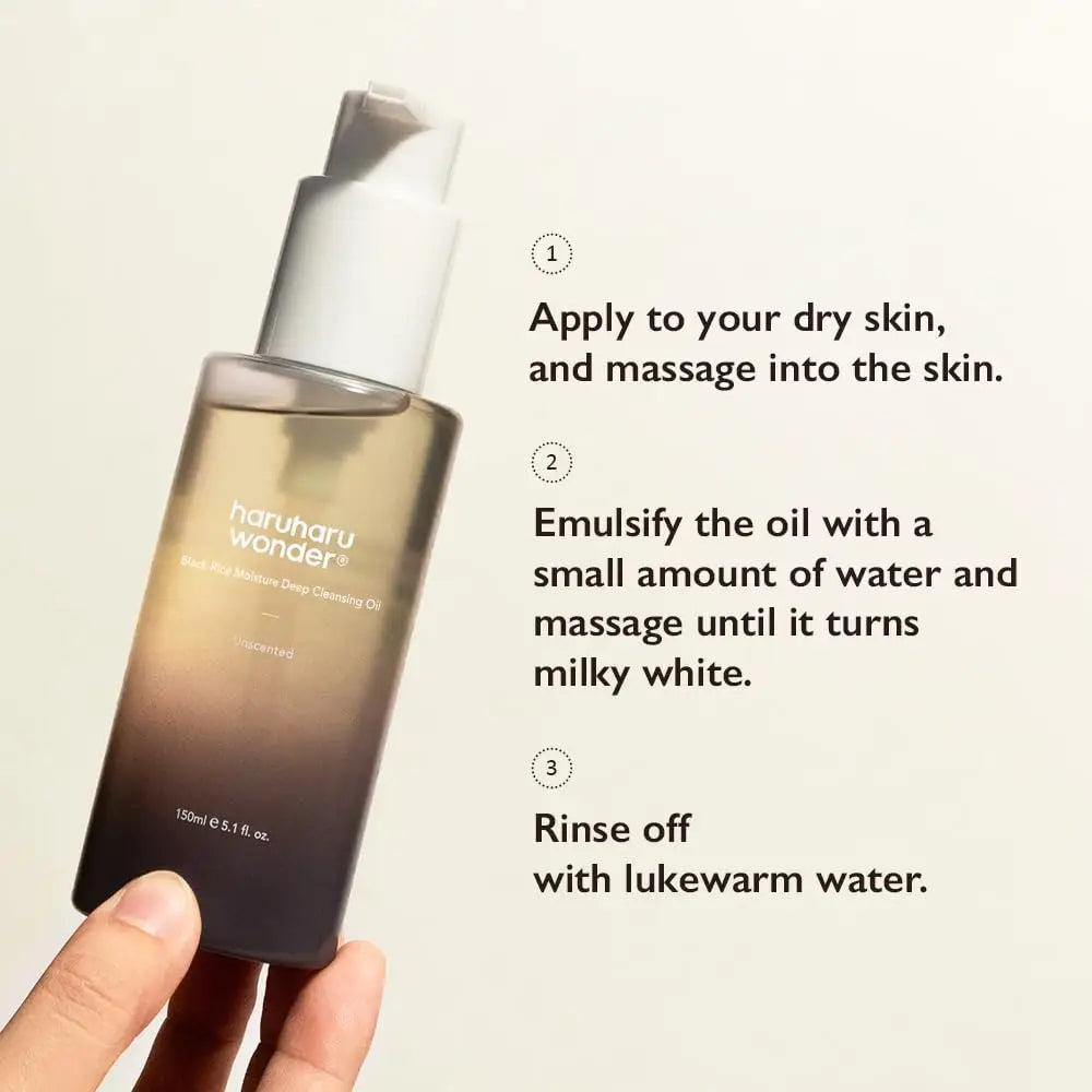 Hand holding a pump bottle of haruharu wonder Black Rice Moisture Deep Cleansing Oil 150ml next to step-by-step usage instructions on applying, emulsifying with water, and rinsing with lukewarm water.