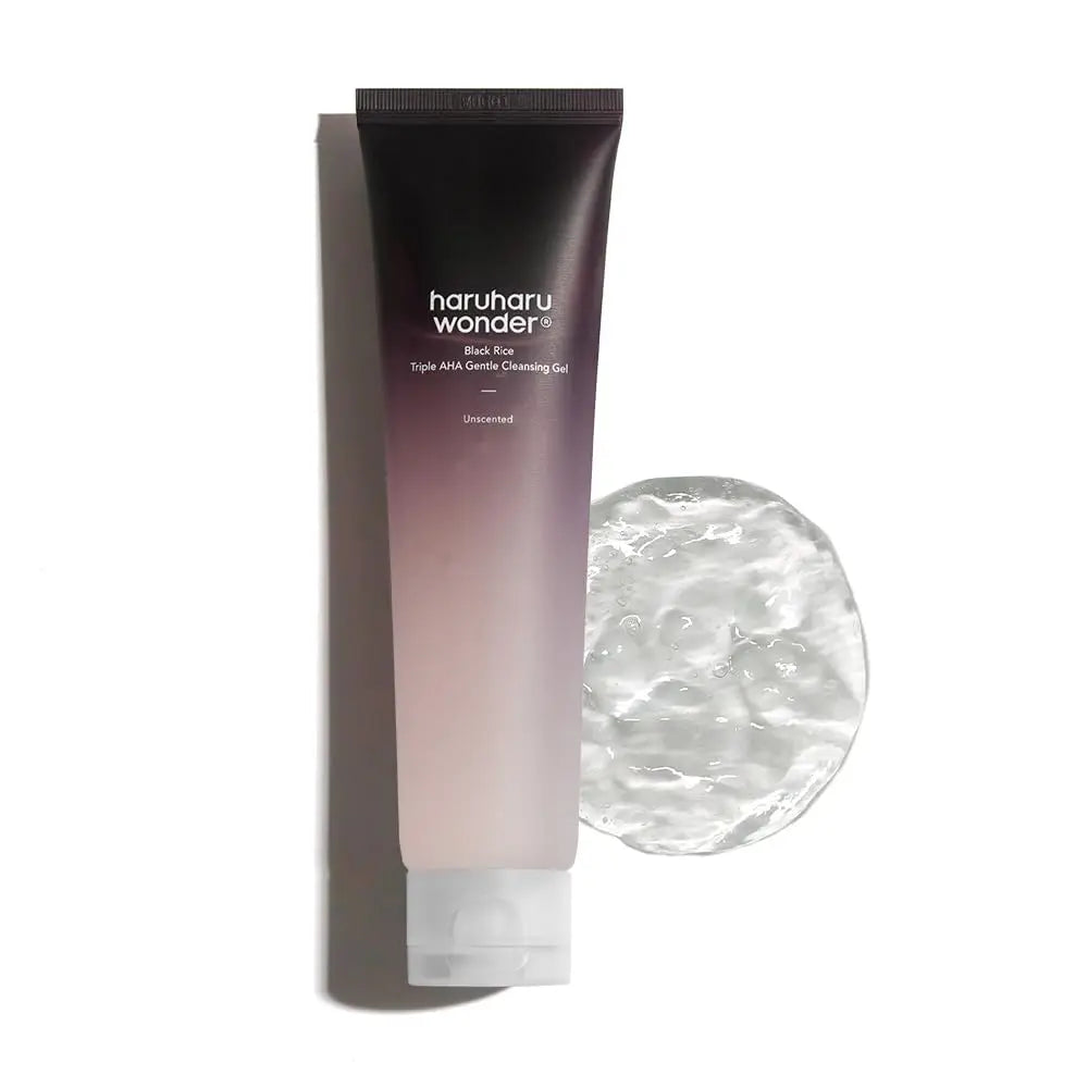 Tube of haruharu wonder Black Rice Triple AHA Gentle Cleansing Gel 100ml with a clear gel swatch beside it on a white background, showcasing smooth texture.