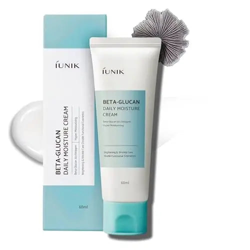 IUNIK Beta Glucan Daily Moisture Cream 60ml tube with light blue cap standing next to its matching box, showcasing skincare product for hydration and wrinkle care.