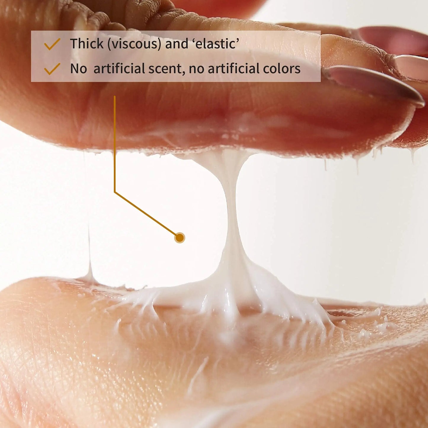 Close-up of viscous, elastic white cream stretched between two fingers, demonstrating texture with text highlighting no artificial scent or colors, for IUNIK Beta Glucan Daily Moisture Cream 60ml + iUNIK Black Snail Restore Cream 60ml.