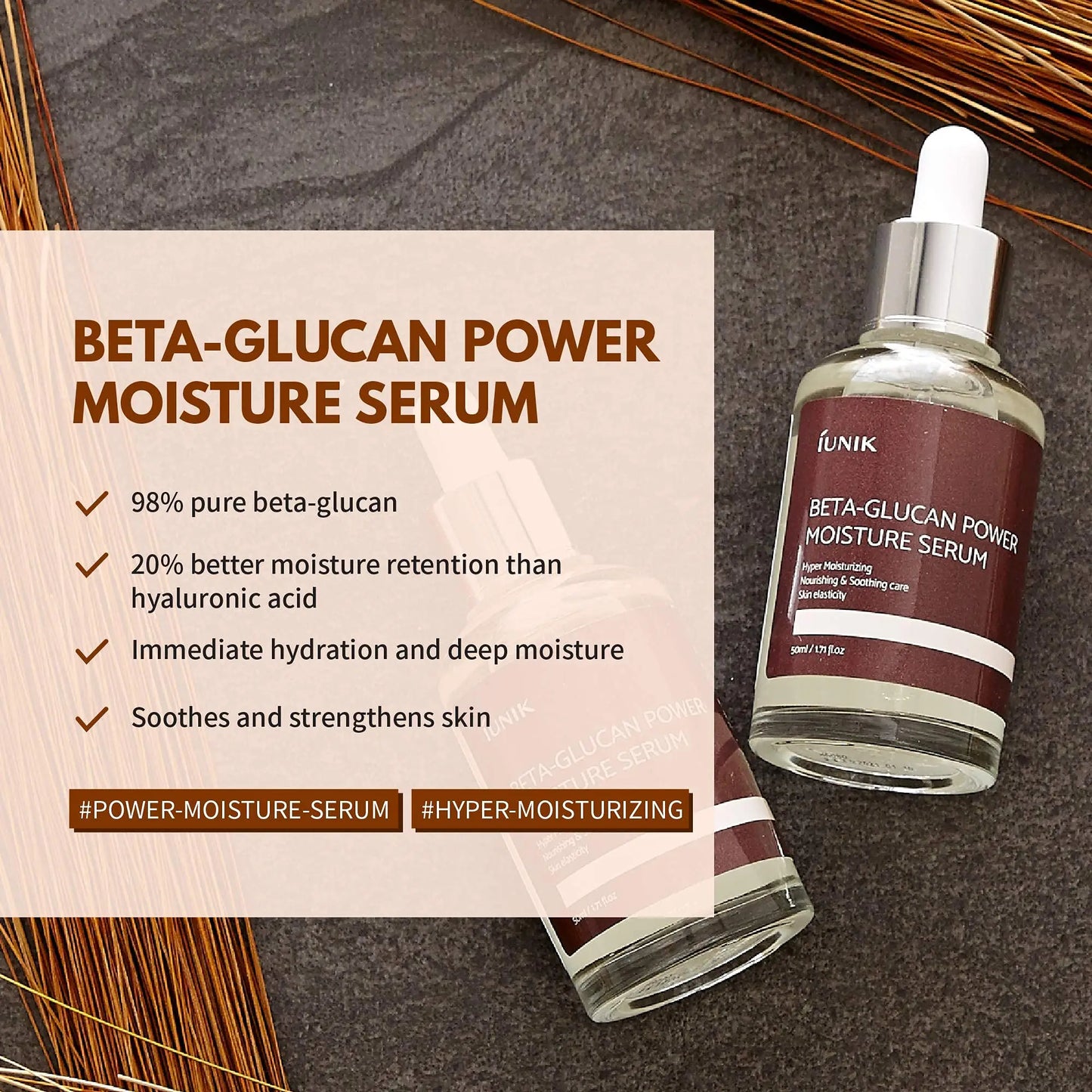 Two bottles of iUNIK Beta Glucan Power Moisture Serum 50m + iUNIK Black Snail Restore Serum 50ml displayed on a gray textured surface with wooden accents and a list of serum benefits.