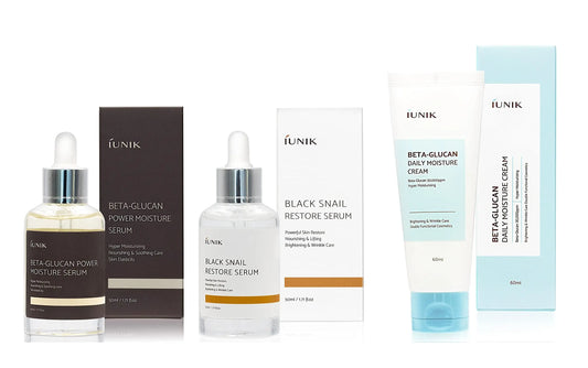 iUNIK Beta Glucan Power Moisture Serum 50ml, iUNIK Black Snail Restore Serum 50ml, and IUNIK Beta Glucan Daily Moisture Cream 60ml skincare set with packaging boxes.