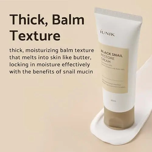 iUNIK Black Snail Restore Cream 60ml tube with thick balm texture melting into the skin, highlighting moisturizing benefits and snail mucin for hydration and nourishment.