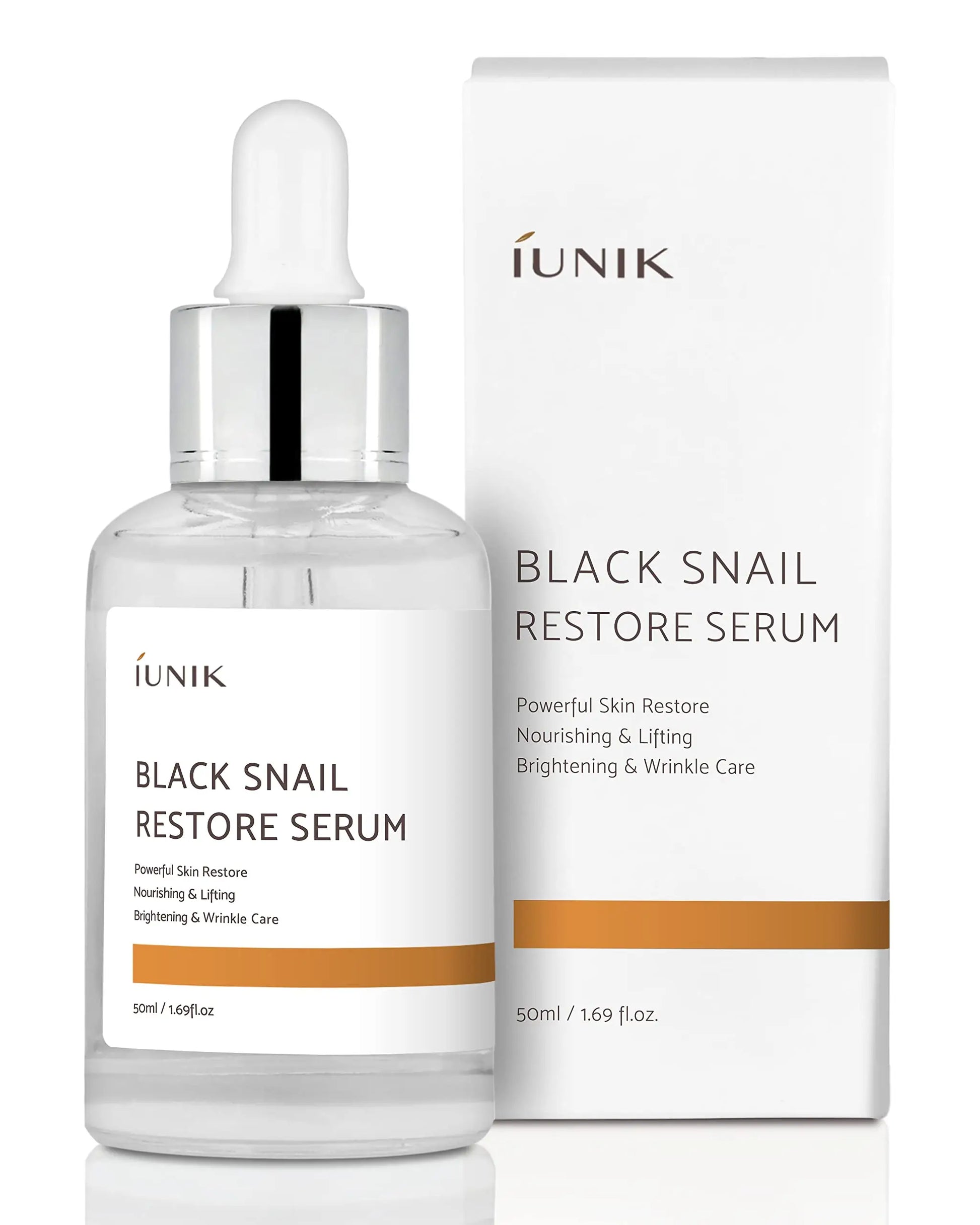 iUNIK Black Snail Restore Serum 50ml in clear glass dropper bottle with white and gold label beside matching white and gold product box for skin nourishment and wrinkle care