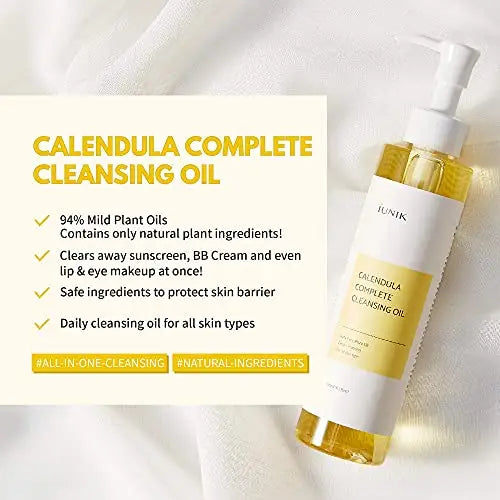 Bottle of iUNIK Calendula Complete Cleansing Oil, 200ml, with text highlighting 94% mild plant oils, natural ingredients, makeup removal, skin barrier protection, and suitability for all skin types, part of the iUNIK Calendula Complete Cleansing Oil, 200ml + iUNIK Centella Bubble Cleansing Foam, 150ml set.