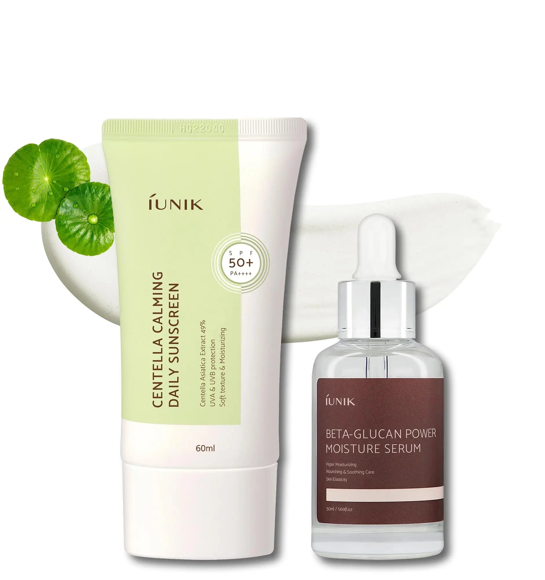iUNIK Centella Calming Daily Sunscreen 60ml and iUNIK Beta Glucan Power Moisture Serum 50ml displayed with green centella leaves and product texture swatches for skincare hydration and protection.