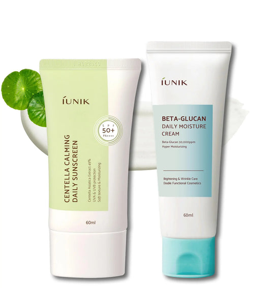 Two skincare tubes with green and blue labels placed side by side on a white background with Centella leaves behind, showing iUNIK Centella Calming Daily Sunscreen 60ml + iUNIK Beta Glucan Power Moisture Serum 50ml.