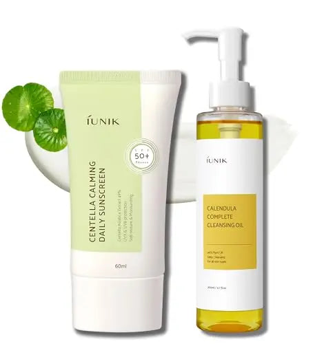 iUNIK Centella Calming Daily Sunscreen 60ml + iUNIK Calendula Complete Cleansing Oil, 200ml displayed with green centella leaves and white background, highlighting skincare essentials for calm and clean skin.