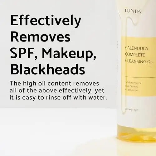 Text promoting the cleansing power of iUNIK Calendula Complete Cleansing Oil, highlighting its effectiveness in removing SPF, makeup, and blackheads while being easy to rinse off; accompanied by a partial view of the product bottle with a clear yellow liquid and cream texture on the label, featuring the full product title "iUNIK Centella Calming Daily Sunscreen 60ml + iUNIK Calendula Complete Cleansing Oil, 200ml.