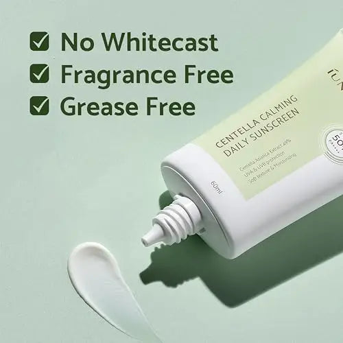 iUNIK Centella Calming Daily Sunscreen 60ml + iUNIK Calendula Complete Cleansing Oil, 200ml featuring a tube of sunscreen with a smooth cream swatch, highlighting no whitecast, fragrance free, and grease free benefits.