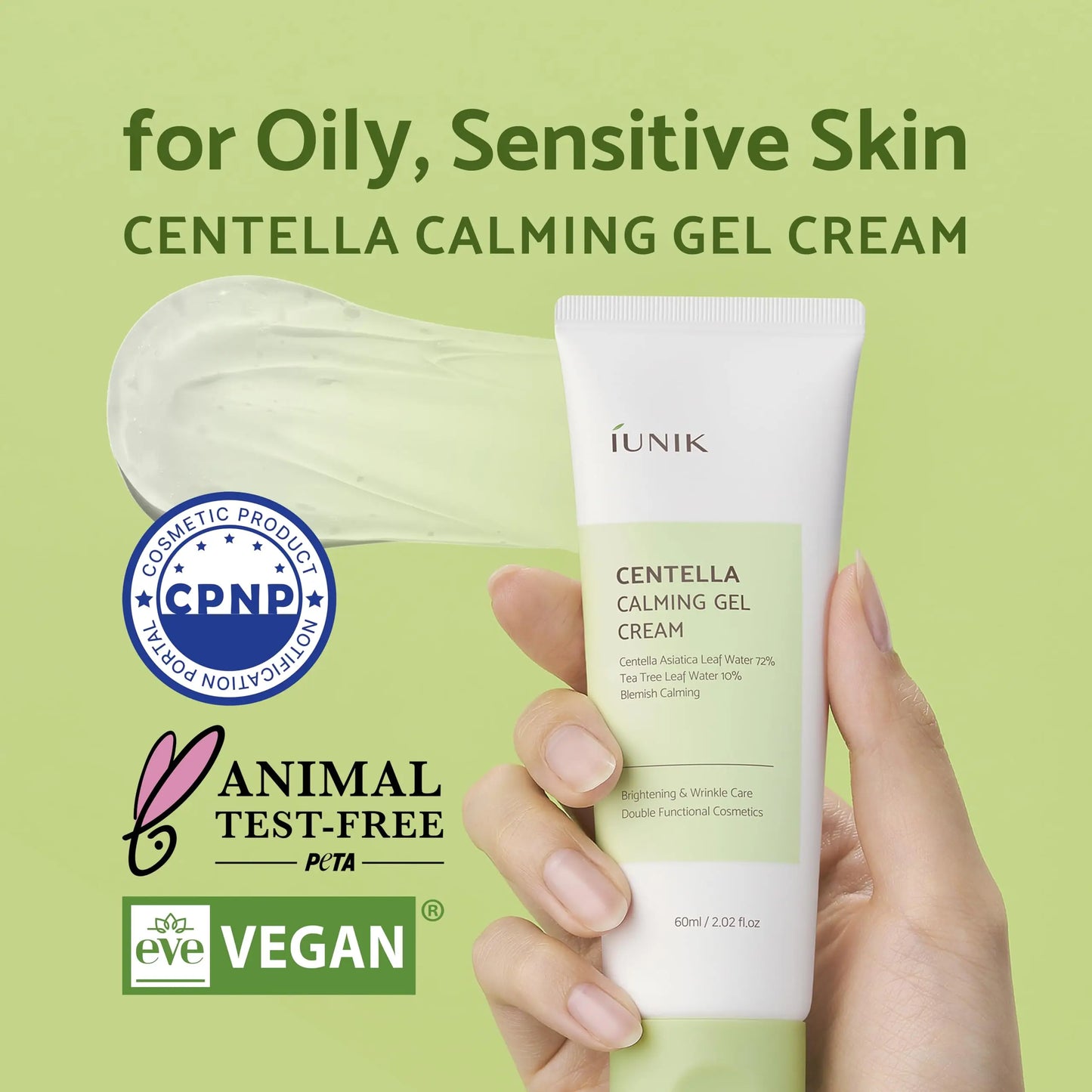 Hand holding a tube of iUNIK Centella Calming Gel Cream 60ml + iUNIK Centella Mild Cleansing Foam, 120ml, with text promoting it for oily, sensitive skin and labels for cruelty-free and vegan certifications.