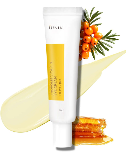 iUNIK Propolis Vitamin Eye Cream, 30ml tube with a yellow label, shown with a smooth cream texture, honeycomb piece, and orange sea buckthorn berries on a white background.