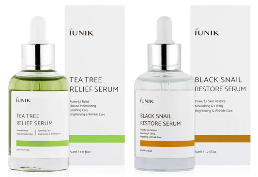iUNIK Tea tree Relief Serum 50ml + iUNIK Black Snail Restore Serum 50ml bottles with dropper caps and matching product boxes, designed for skin soothing and brightening care.