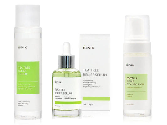 iUNIK Tea Tree Relief Toner 200ml, iUNIK Tea tree Relief Serum 50ml with box, and iUNIK Centella Bubble Cleansing Foam 150ml displayed on white background