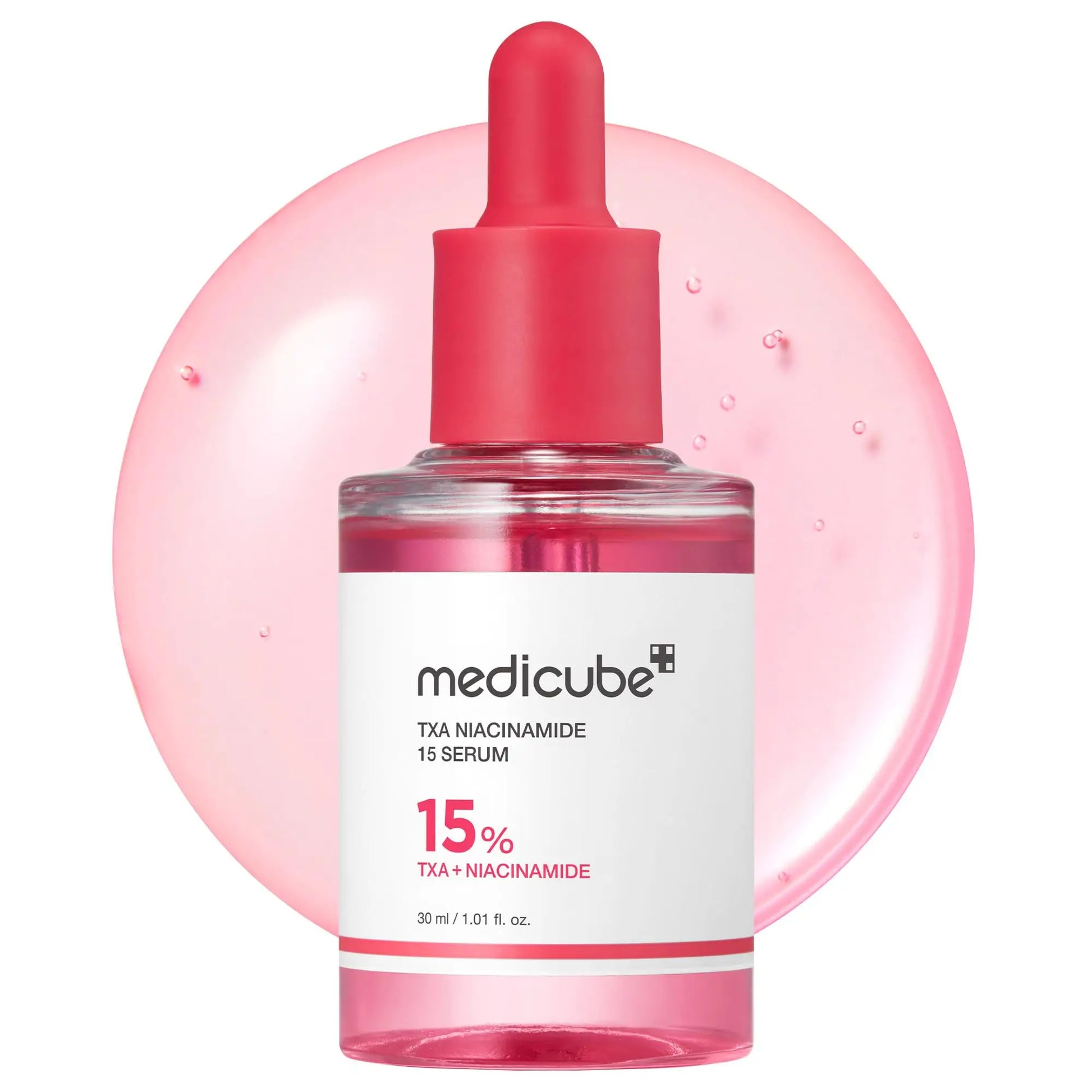 medicube TXA Niacinamide 15 Serum 30ml in a clear glass bottle with a red dropper cap, shown with a translucent pink serum droplet background highlighting the formula’s texture.