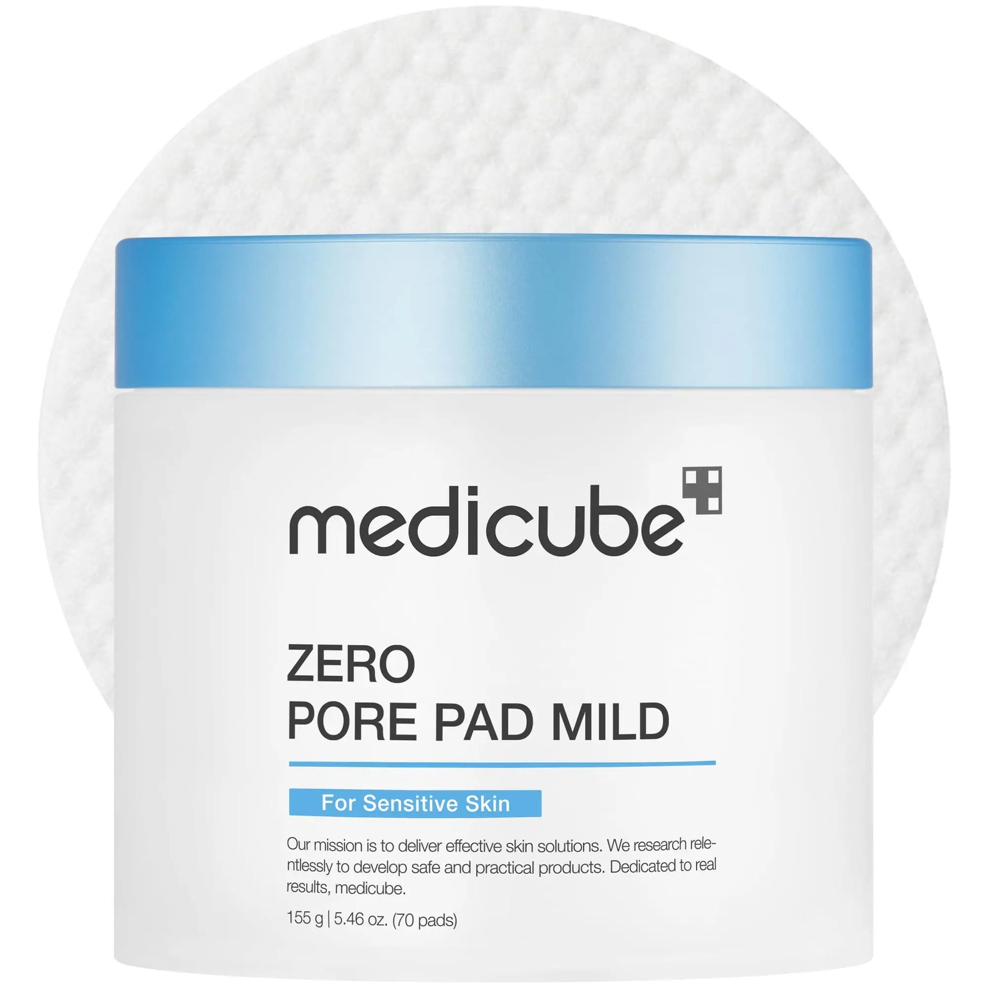 Container of medicube Zero Pore Pad Mild 155g with blue lid placed on a textured white cotton pad background, designed for sensitive skin and gentle exfoliation.