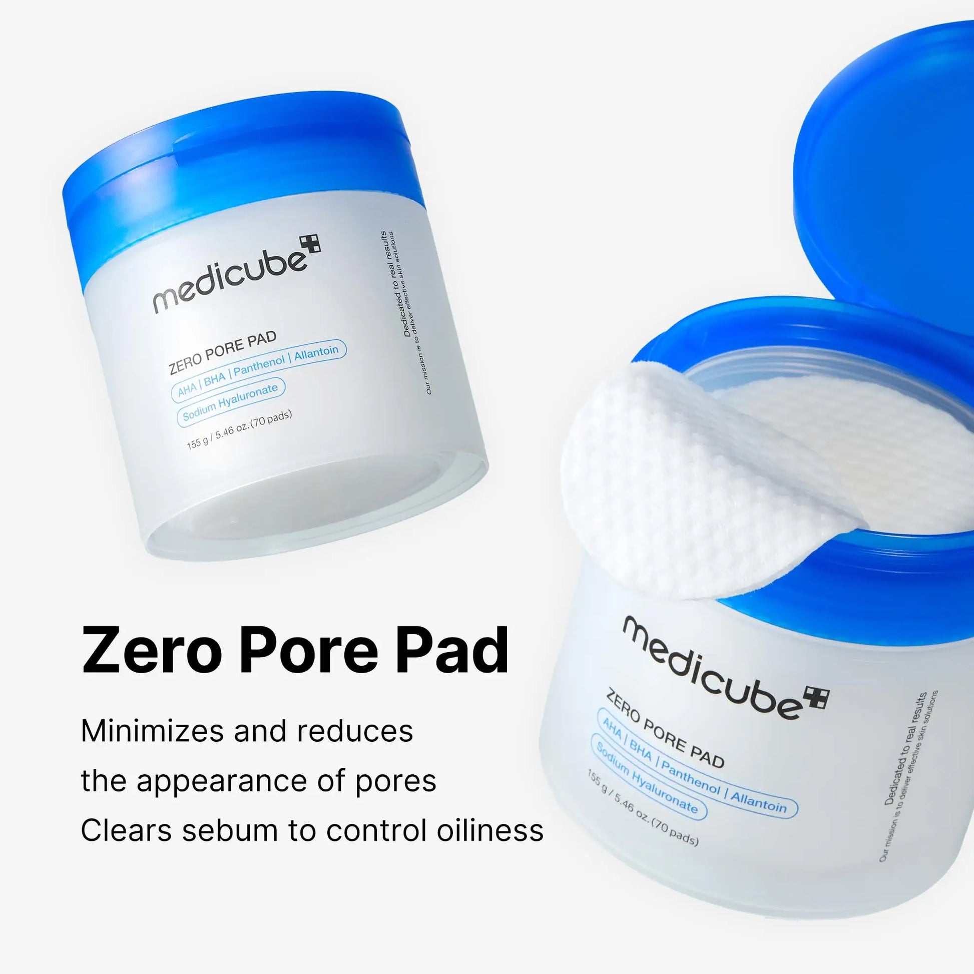 Open and closed containers of medicube Zero Pore Pads 155g 70pcs with a blue lid, showing textured white cleansing pads designed to minimize pores and control oiliness.