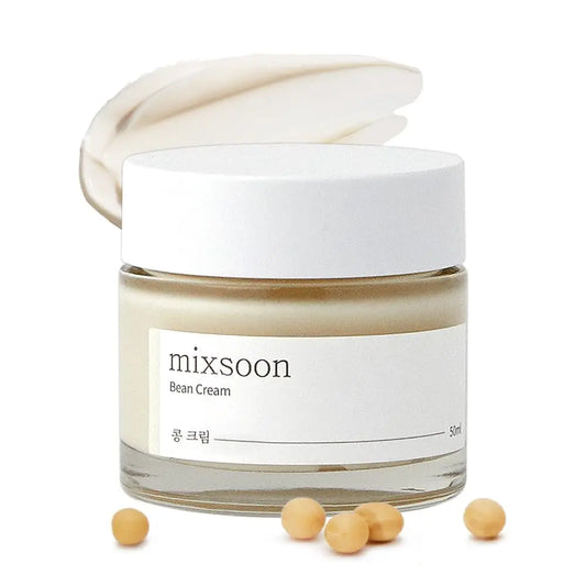Mixsoon Bean Cream 50ml in a clear glass jar with white lid, creamy texture swatched behind, and scattered soybeans in front, highlighting a smooth facial cream product.