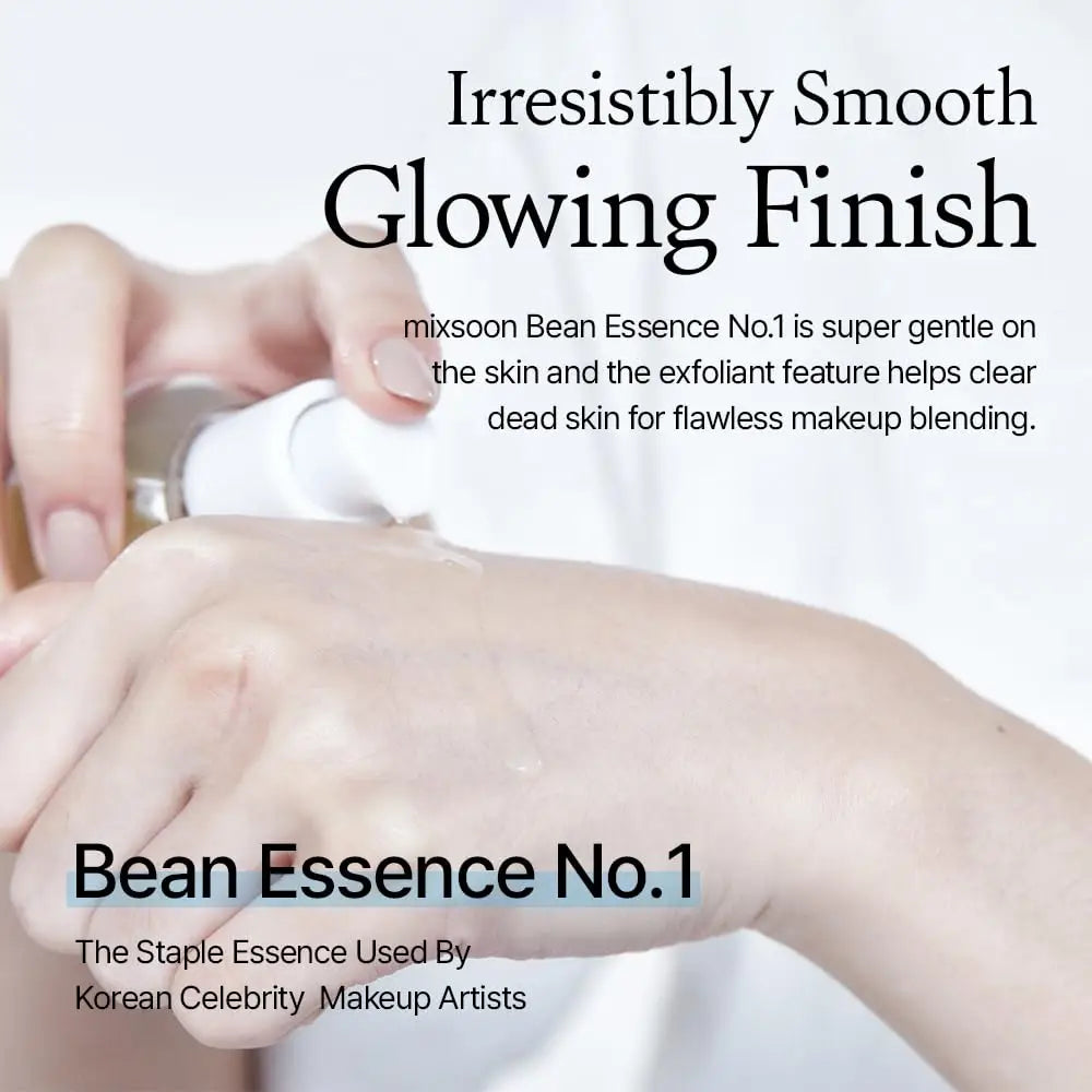 Close-up of hands applying a clear serum on skin, demonstrating the gentle texture of Mixsoon Bean Essence, highlighting its smooth, glowing finish and exfoliating benefits.