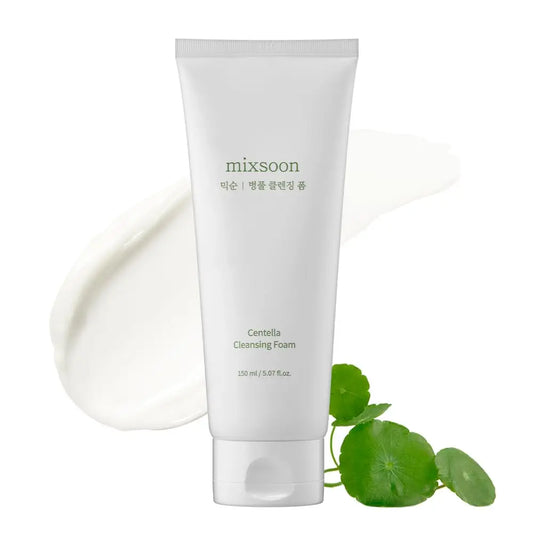 Mixsoon Centella Cleansing Foam 150ml tube with a smooth white cream texture and fresh Centella leaves on a white background, highlighting gentle skincare and soothing ingredients.