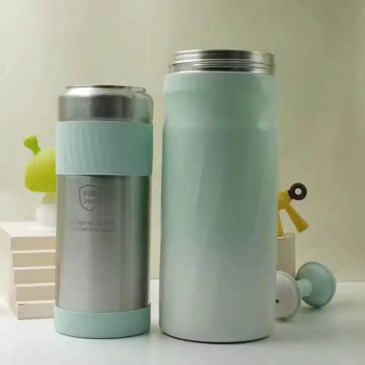 Two sleek stainless steel and pastel blue containers designed for easy portability and cooling, representing the Portable Breast Milk and Water Cooler 24-Hour Extended Cooling | Ice-Free Portable Milk Storage for Travel and Work | All-in-One Ice-Free Cooler and Baby Bottle.