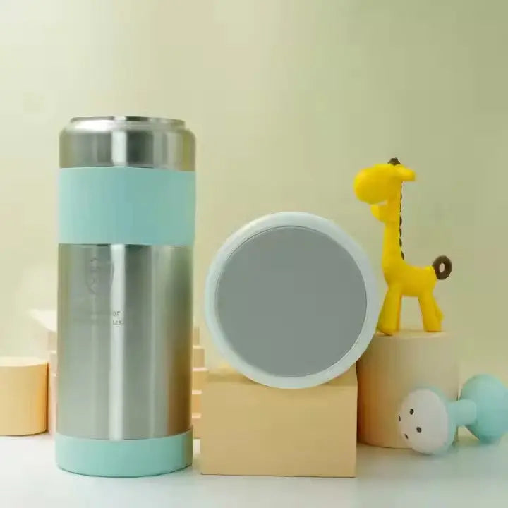 Portable Breast Milk and Water Cooler 24-Hour Extended Cooling | Ice-Free Portable Milk Storage for Travel and Work | All-in-One Ice-Free Cooler and Baby Bottle with stainless steel body and pastel blue accents next to a yellow giraffe toy.