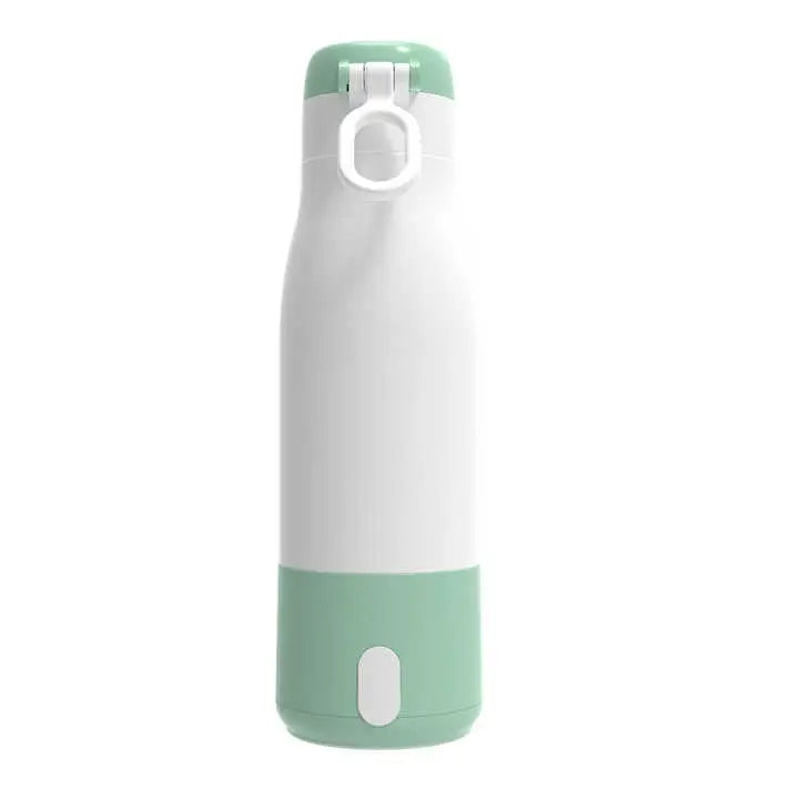 White and green portable water bottle with electric heating with a flip lid on a white background